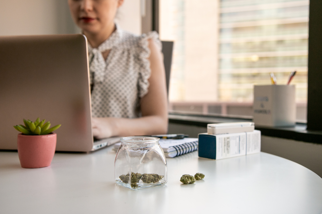 Female Cannabis Entrepreneur working on Marketing for Marijuana Business